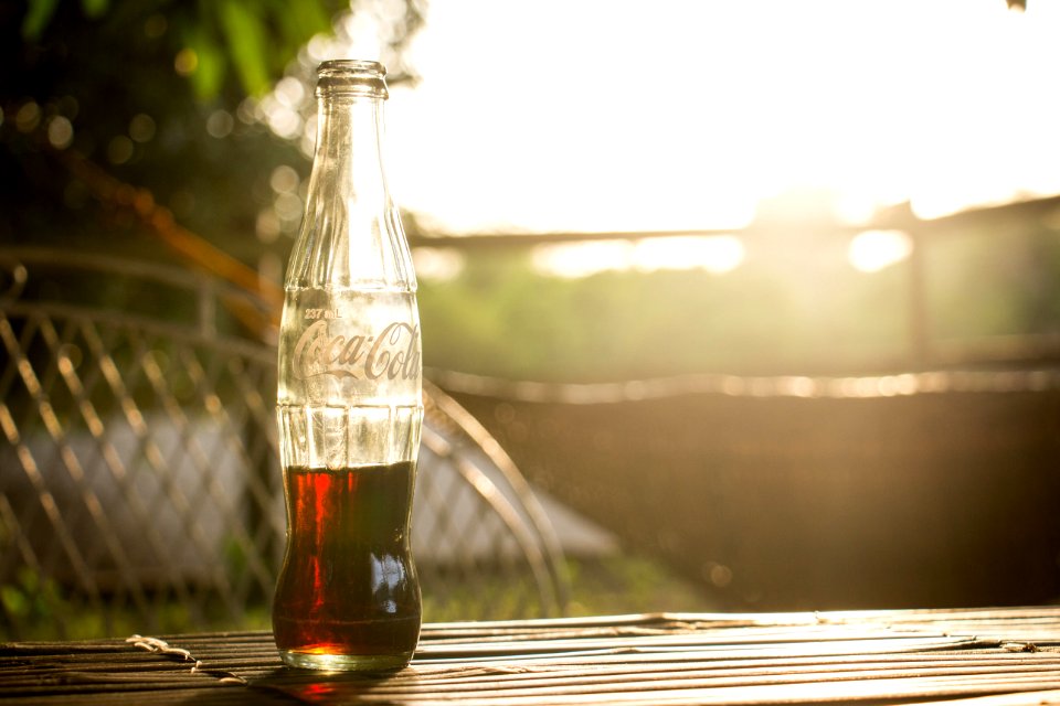 selective photo of a Coca-Cola bottle