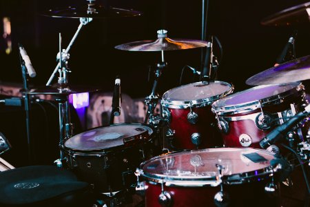 selective focus photography of red drum set photo