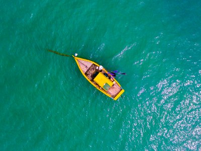 aerial view photography rowboat on body of water photo