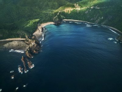 aerial photograph of sea and island photo