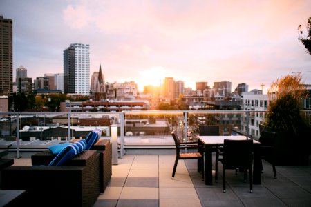 patio set in terrace overlooking city photo