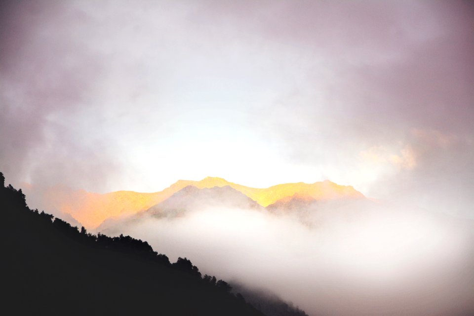 mountains surrounded by clouds
