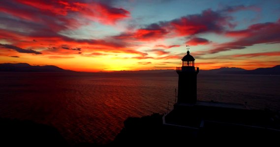 photo of lighthouse and a sunset