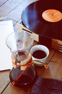 clear glass coffee pitcher beside turntable photo