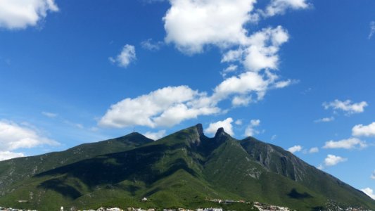 mountains covered with cloud shadows photo