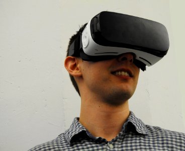 man wearing VR glass headset photo