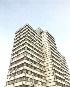 low-angle photography of grey high-rise building photo