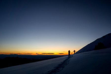 person standing on snowfield during daytime photo