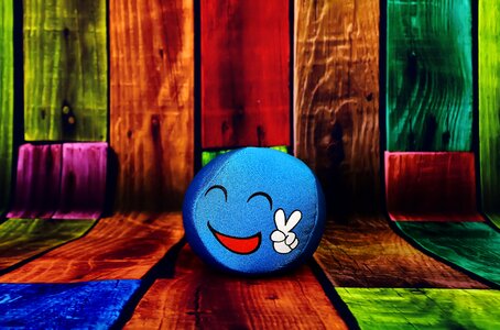 Blue emoticon laugh