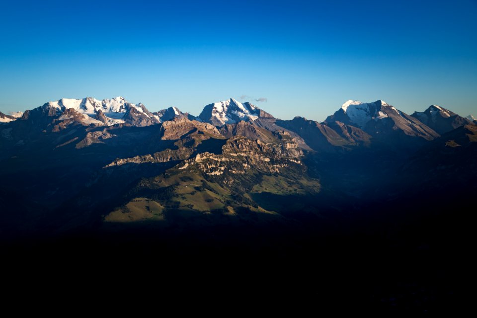 photo of mountains and sky