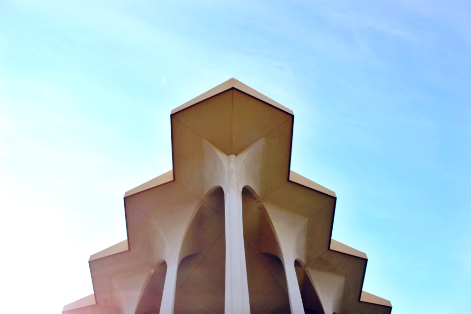white and brown concrete building during daytime
