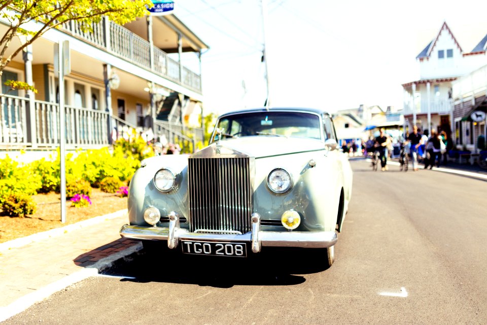 classic white vehicle on concrete road