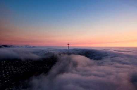 tower surrounded by clouds
