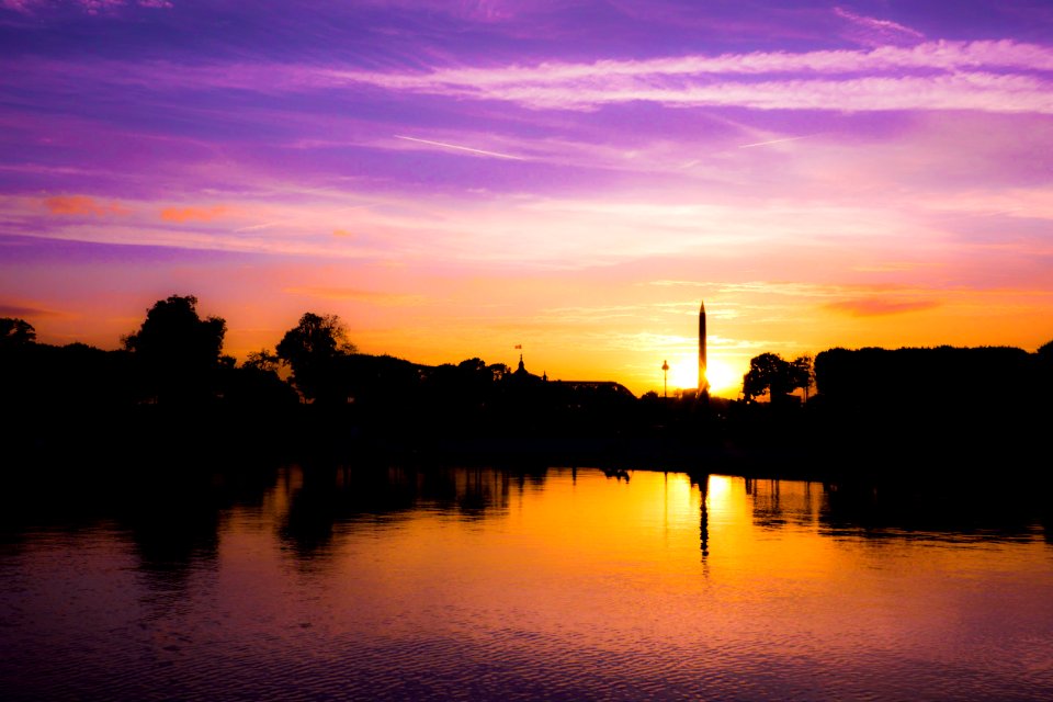 photo of body body of water during golden hour