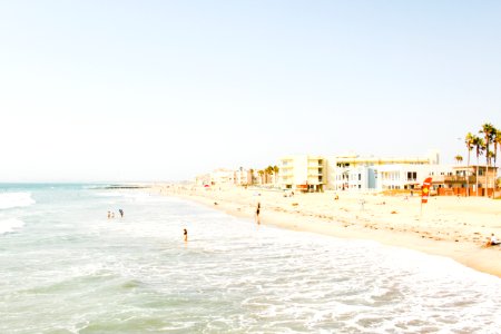 beach near building at daytime