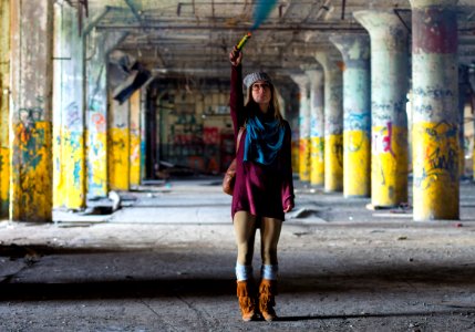 woman standing on gray pavement photo