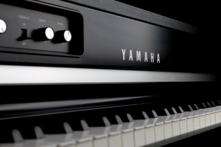 close up photography of black Yamaha piano photo