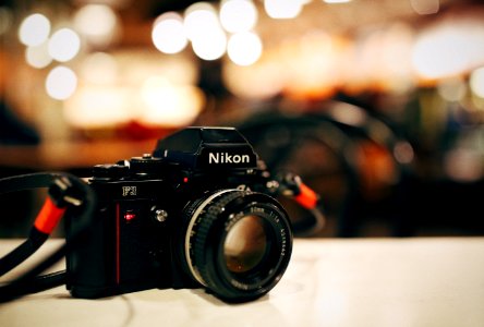 selective focus photography of black Nikon MILC-camera photo
