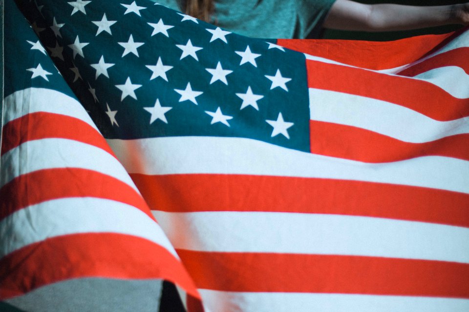 person holding USA flag