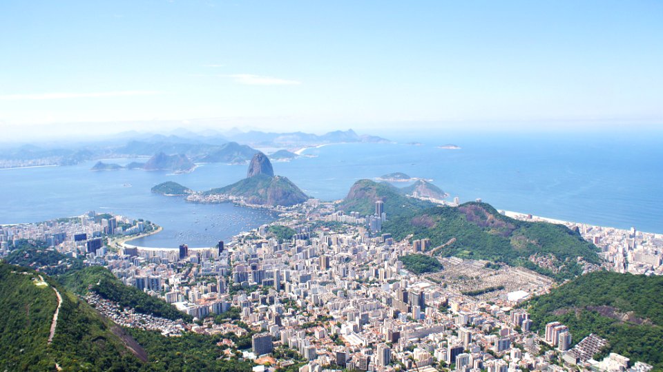 aerial photography of city near body of water at daytime photo