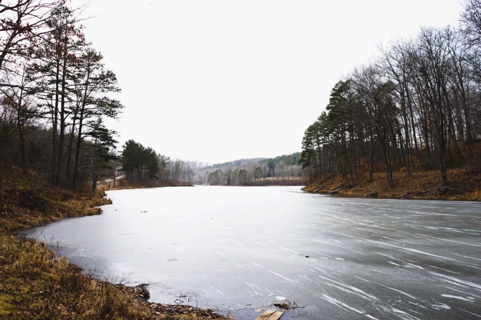 river under cloudy sky during daytime