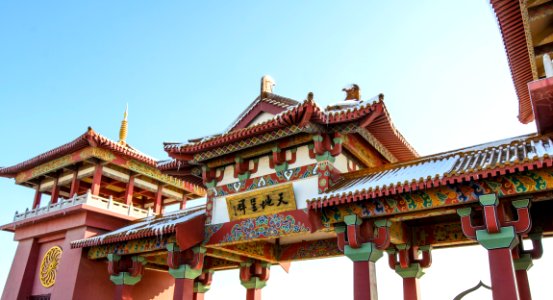 low angle photography of temple gate with Kanji text photo