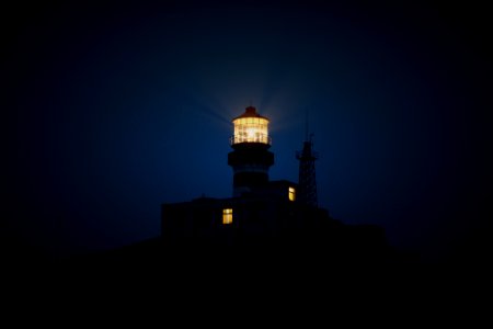 lighthouse during night time