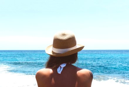 woman standing on beach photo