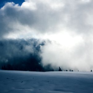 cloudy mountain taken at daytime photo