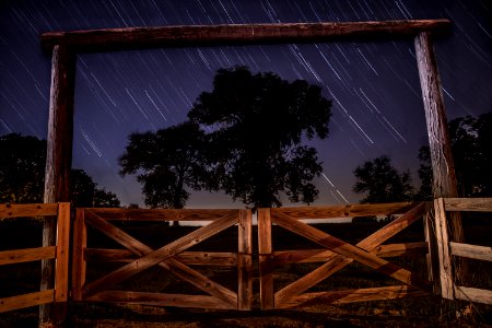 worm's eye view photography of brown wooden barn doors