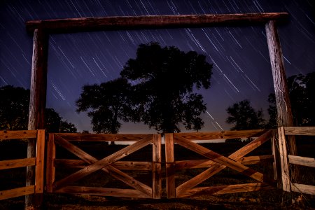 worm's eye view photography of brown wooden barn doors