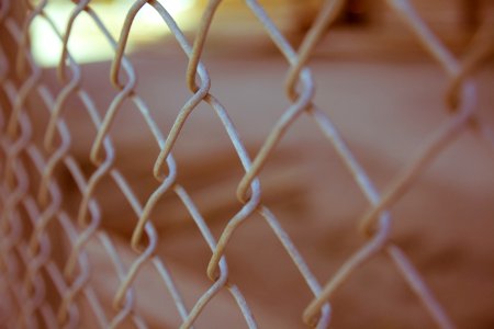 white steel cyclone fence photo