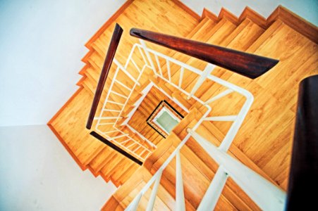 brown wooden spiral stairs photo