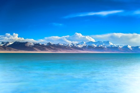 mountain near on body of water photography
