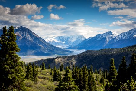 green mountain across body of water photo