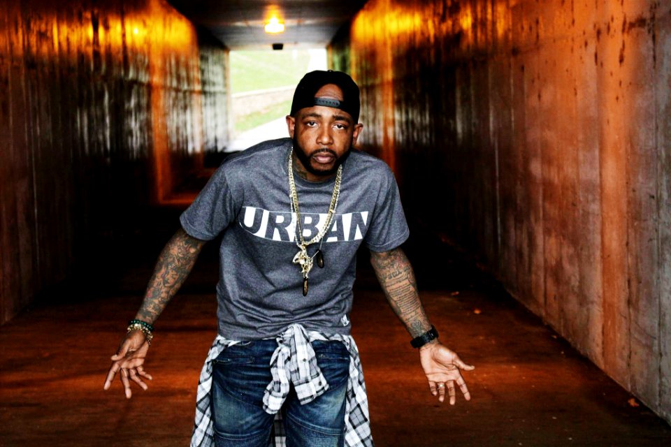 man standing inside the tunnel photo