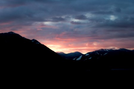 silhouette of mountains during golden hour photo