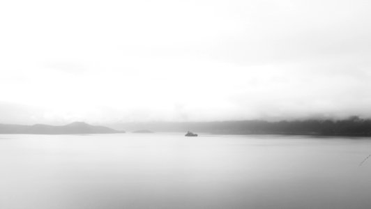 grayscale photo of a body of water