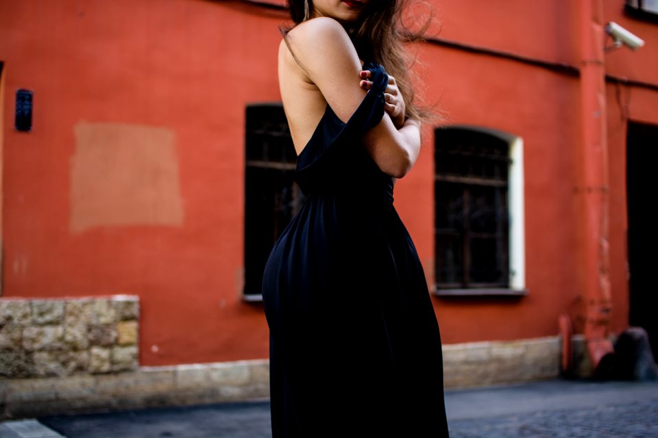 woman standing with cross arm