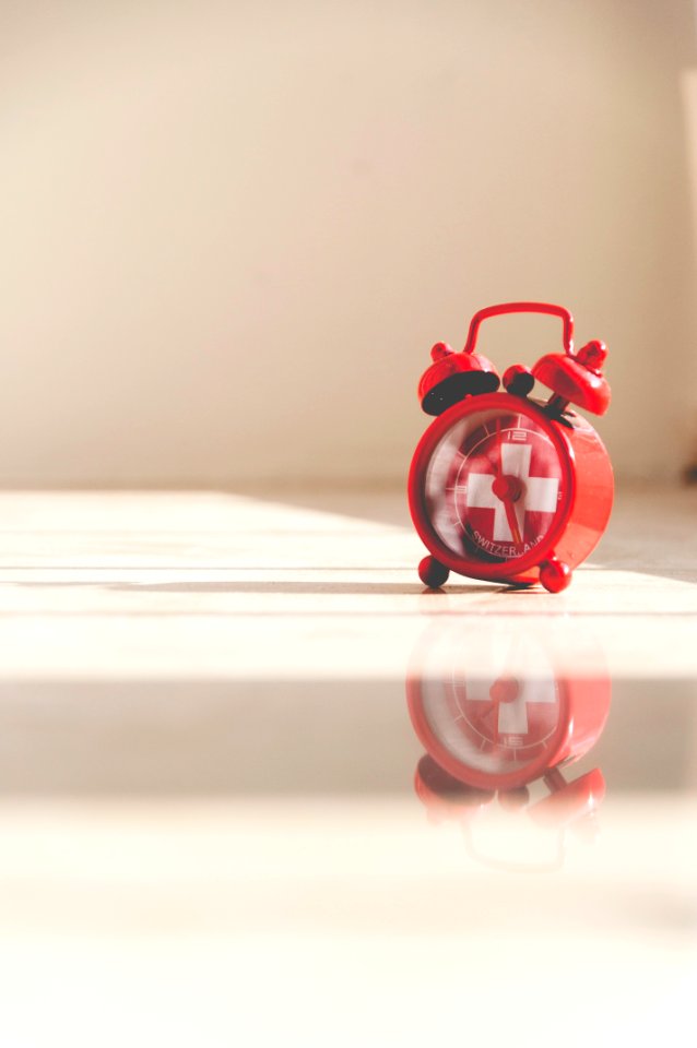 red twin bell alarm clock