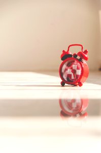 red twin bell alarm clock
