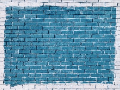 gray concrete bricks painted in blue photo
