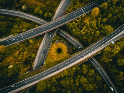 aerial photography of interlocking freeways with travelling cars photo