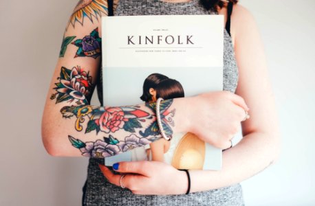 person holding Kinfolk book photo