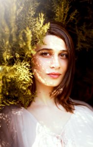 woman near green leafed plants during daytime
