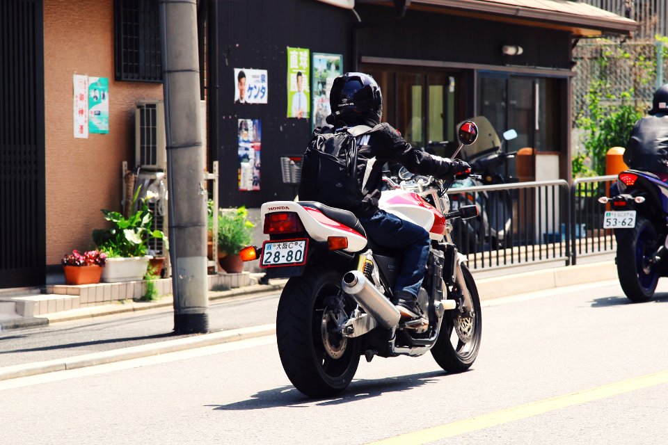 person riding sports bike