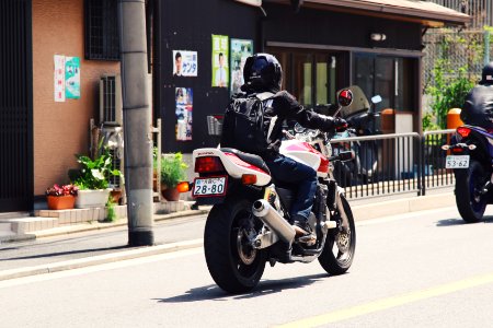 person riding sports bike photo