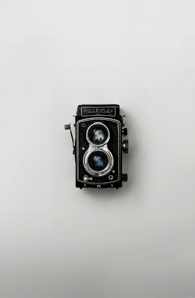 black and silver vintage camera