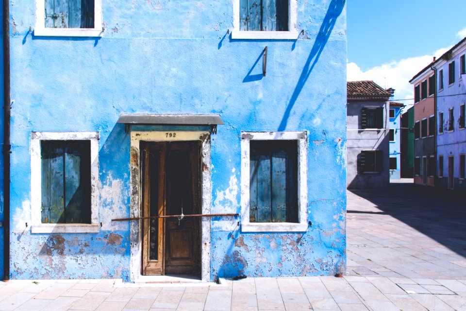 white and blue concrete house