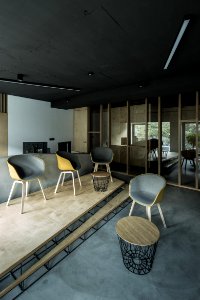 four brown wooden chairs inside house photo